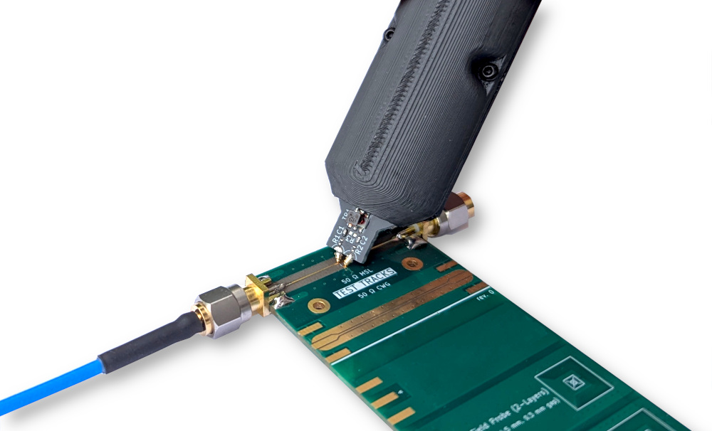 Rev 2.0 of the RF probe being used on a transmission line.
